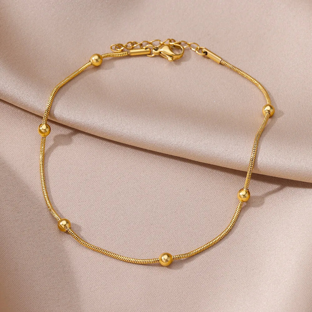Damen Fußkettchen mit goldenen Kugeln