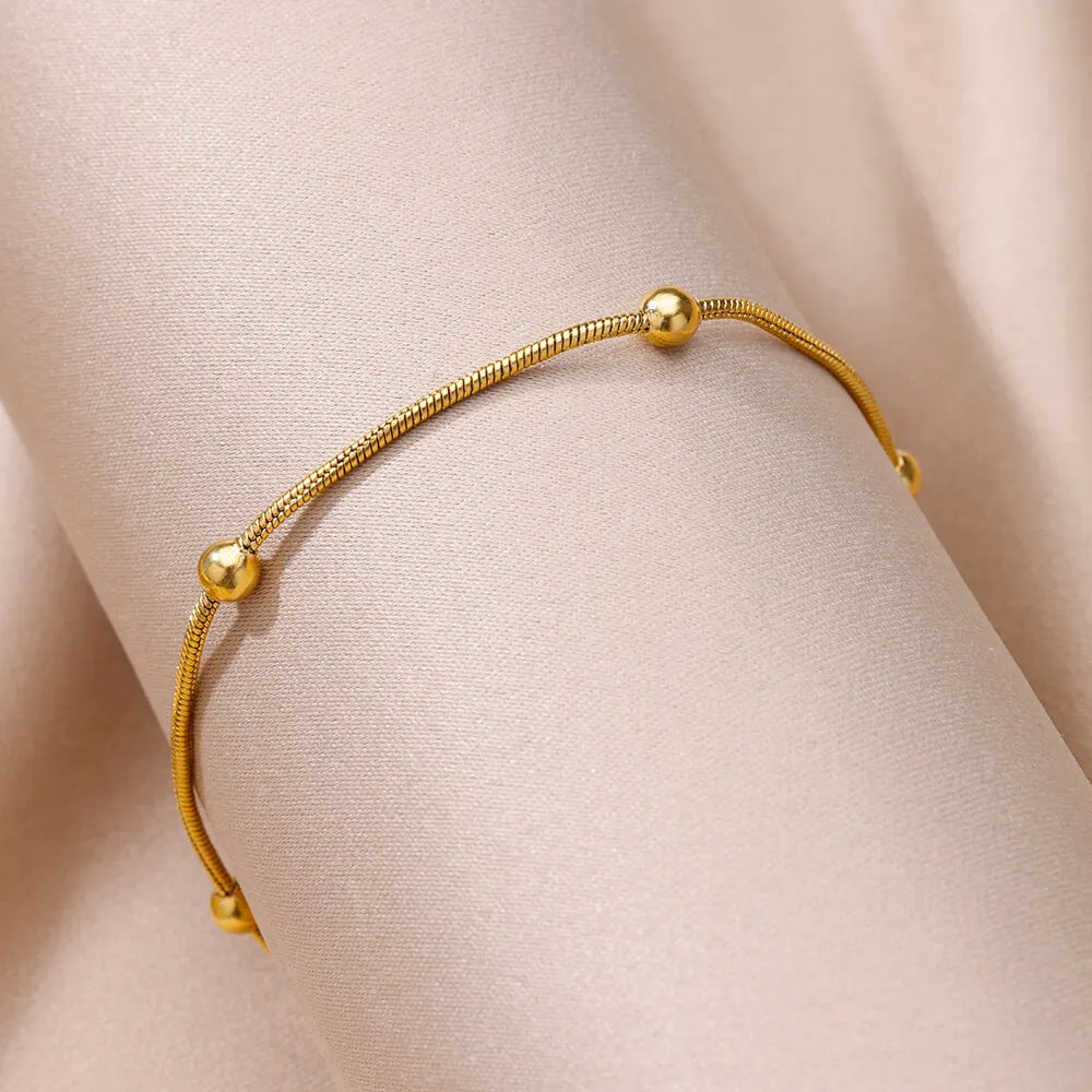 Damen Fußkettchen mit goldenen Kugeln