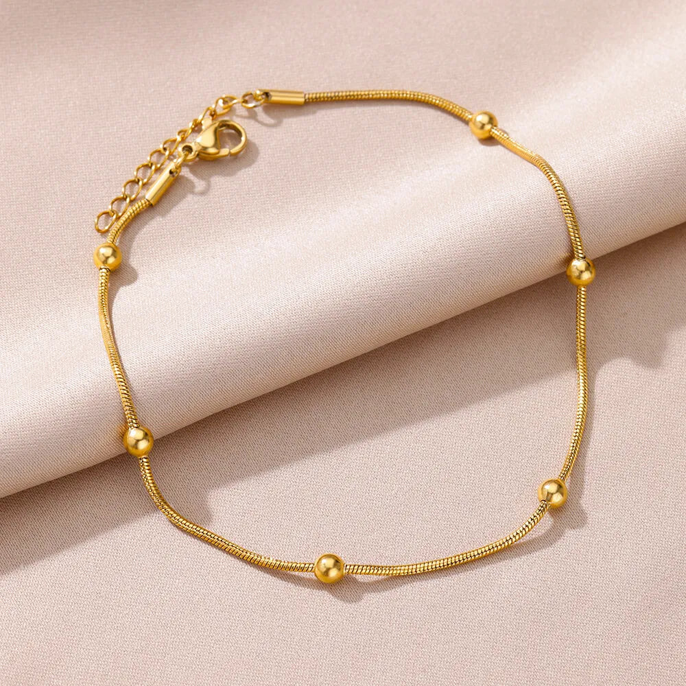 Damen Fußkettchen mit goldenen Kugeln