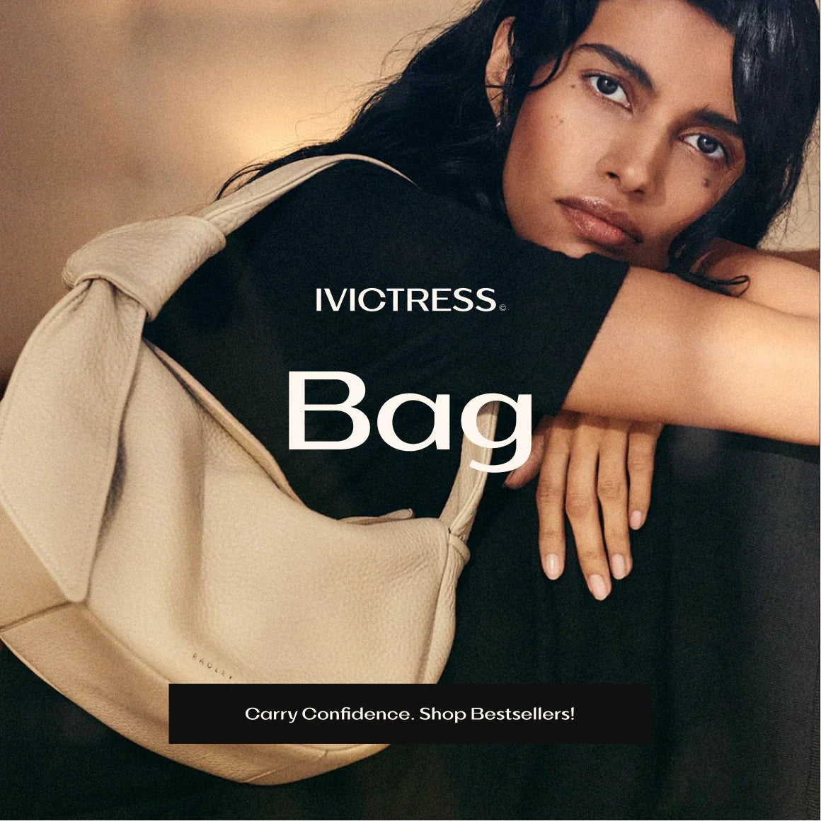 Beige textured shoulder bag with knot detail, worn by woman in black top, stylish accessories