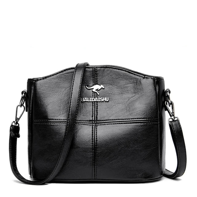 Elegante geborduurde leren tas en crossbodytas voor dames
