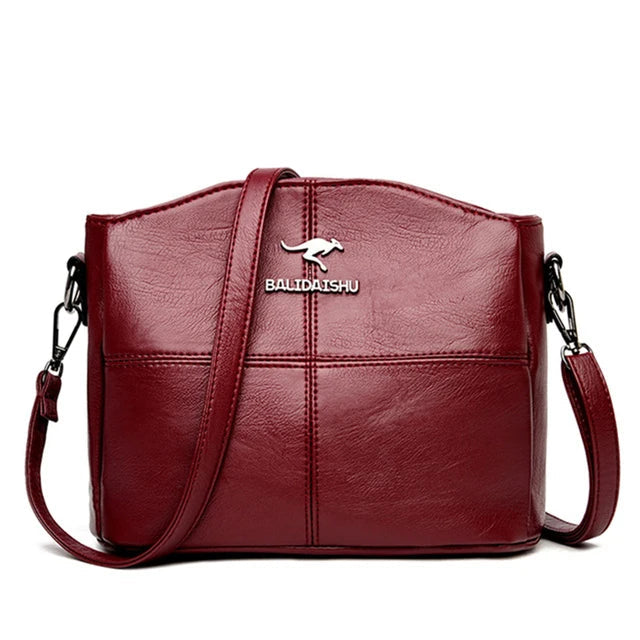 Elegante geborduurde leren tas en crossbodytas voor dames