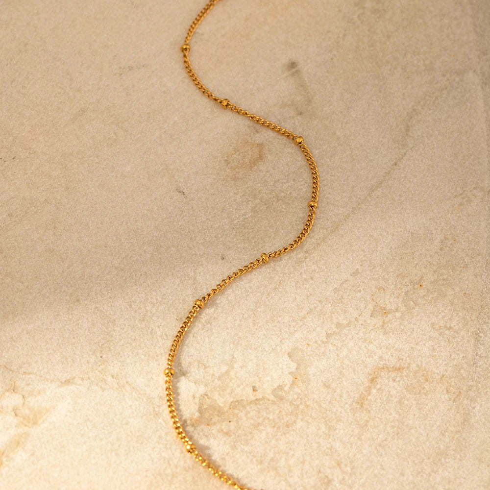 Bracelet de cheville élégant en chaîne et perles
