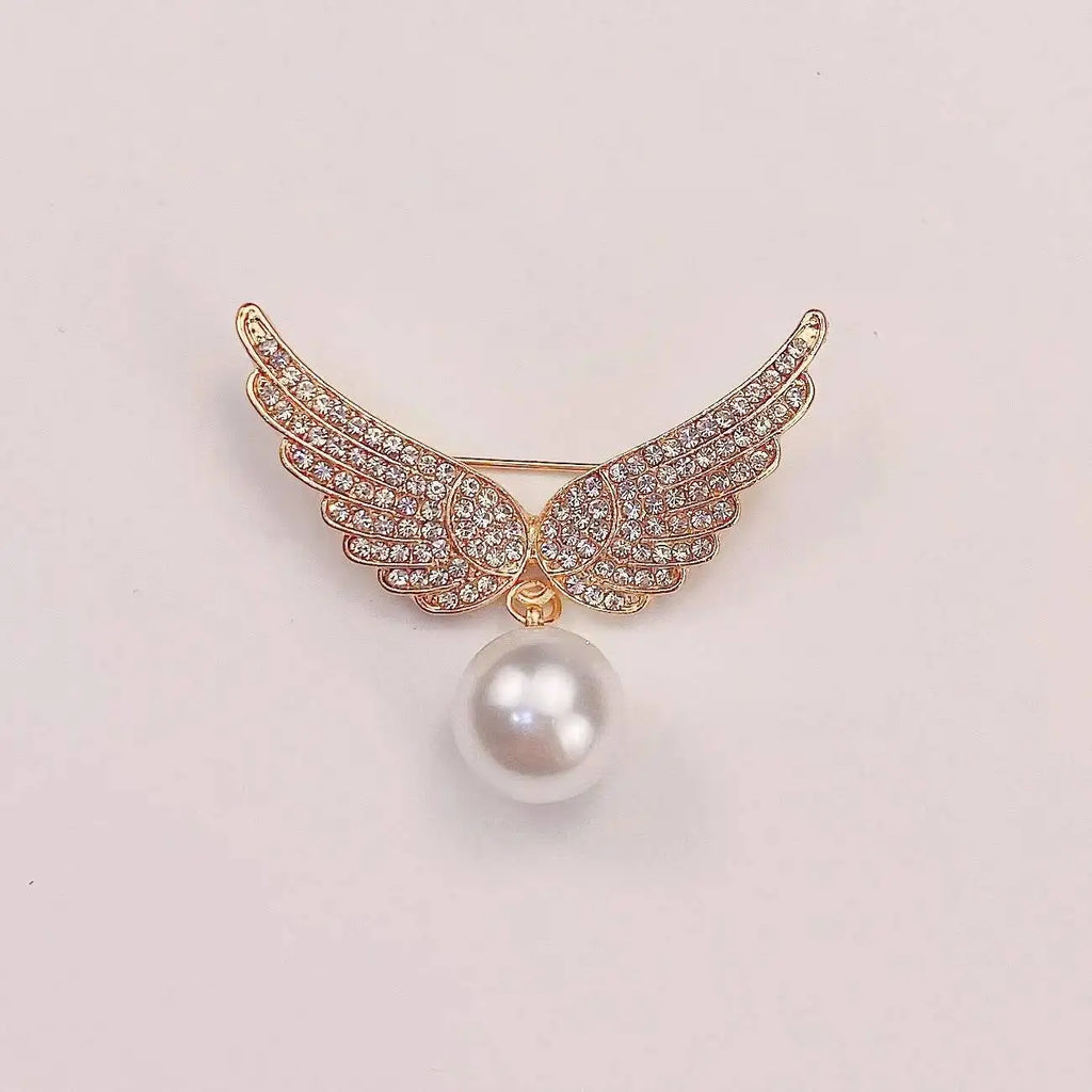 Faux Pearl Crystal Wing Brooch