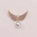 Faux Pearl Crystal Wing Brooch