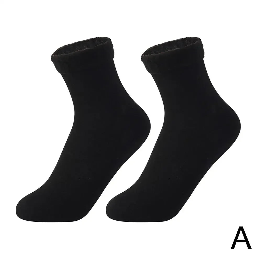 Pair of black ankle socks with soft cuff, plain design on white background