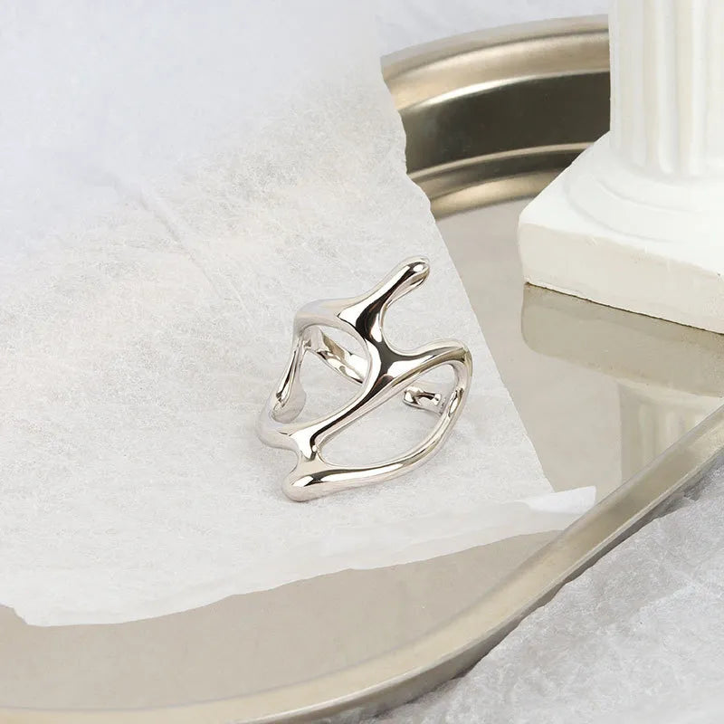 Bague géométrique réglable