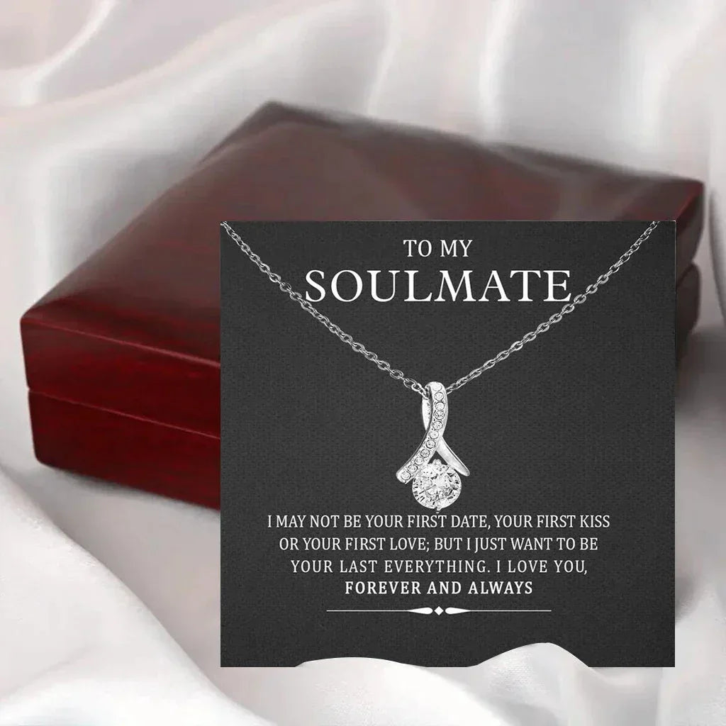 Soulmate message card with silver crystal pendant necklace on chain, jewelry gift box in background