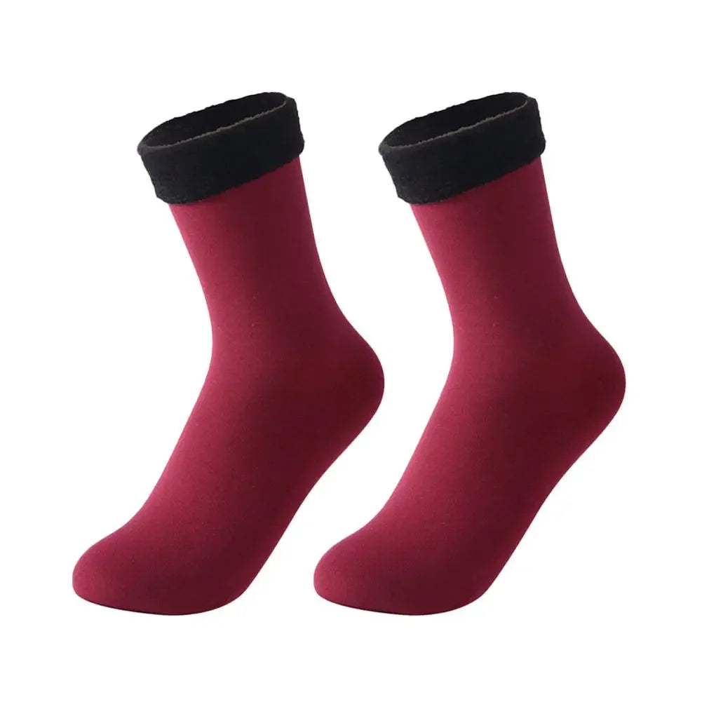 Pair of red ankle socks with black cuffs, cozy women's fashion accessory