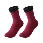 Pair of red ankle socks with black cuffs, cozy women's fashion accessory
