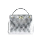 Silver quilted handbag with gold accents, elegant metallic tote purse for women