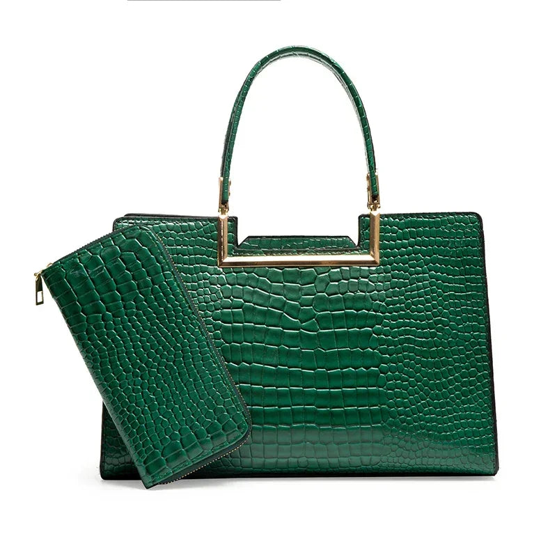 Green crocodile pattern handbag and matching wallet with gold metal handle accents